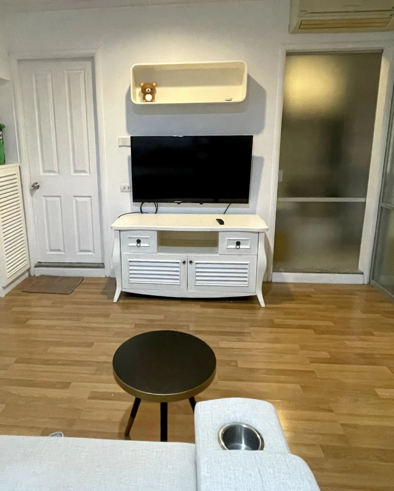 For rent: Lumpini Place Ramintra-Lak Si. Spacious room with partitioned bedroom. Built-in large wardrobe. Sofa bed, made to order, size 2 meters.