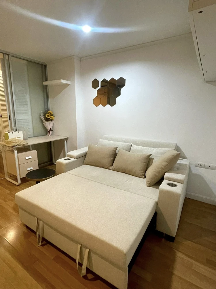 For rent: Lumpini Place Ramintra-Lak Si. Spacious room with partitioned bedroom. Built-in large wardrobe. Sofa bed, made to order, size 2 meters.