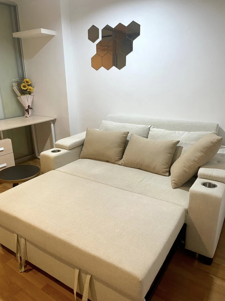 For rent: Lumpini Place Ramintra-Lak Si. Spacious room with partitioned bedroom. Built-in large wardrobe. Sofa bed, made to order, size 2 meters.