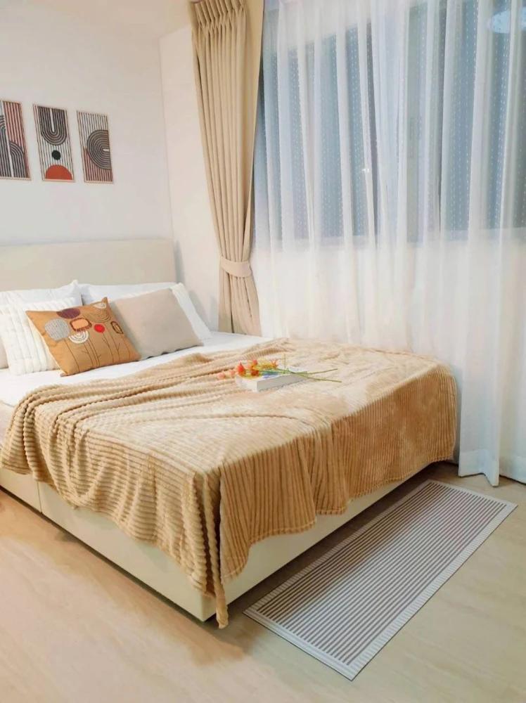 For rent: Lumpini Center Nawamin, fully furnished in Minimalist Muji style. Warm and homey, emphasizing wood accents and a spacious, airy feel, creati