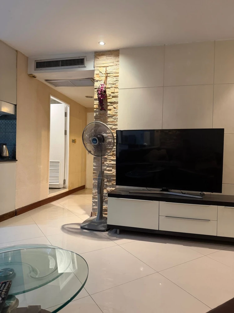 For rent: 2-bedroom, 2-bathroom apartment at Witthayu Complex. Features a large living room, fully furnished, and ready to move in.