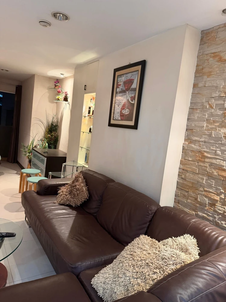 For rent: 2-bedroom, 2-bathroom apartment at Witthayu Complex. Features a large living room, fully furnished, and ready to move in.