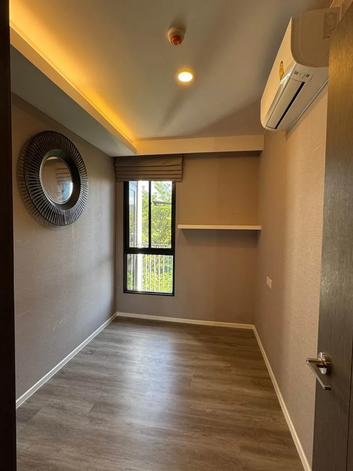 For rent: Very Lasalle, Sukhumvit 105. Pool view from both bedroom and living room. Built-in cabinetry, kitchen with real marble countertops, and bath