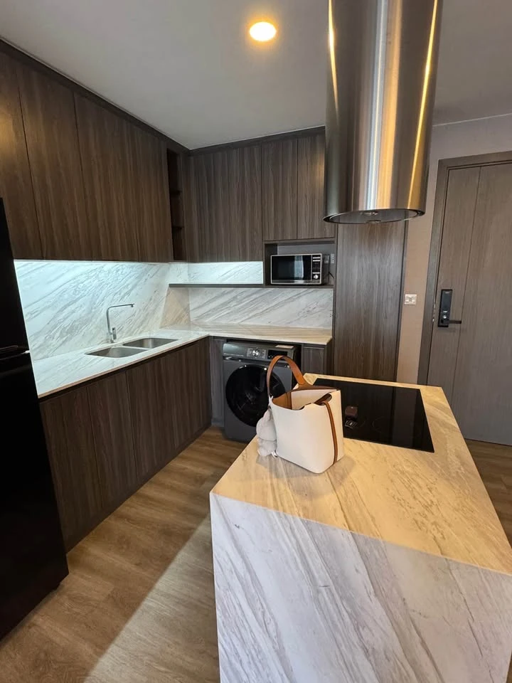 For rent: Very Lasalle, Sukhumvit 105. Pool view from both bedroom and living room. Built-in cabinetry, kitchen with real marble countertops, and bath