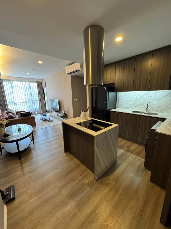 For rent: Very Lasalle, Sukhumvit 105. Pool view from both bedroom and living room. Built-in cabinetry, kitchen with real marble countertops, and bath