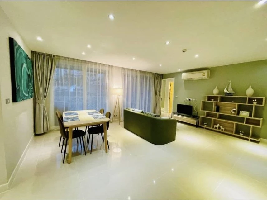 For rent: Grand Caribbean Resort Pattaya, 2 bedrooms, 2 bathrooms, 1st floor, back of the room, open to walk directly into the water park pool. If you