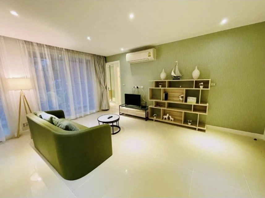 For rent: Grand Caribbean Resort Pattaya, 2 bedrooms, 2 bathrooms, 1st floor, back of the room, open to walk directly into the water park pool. If you