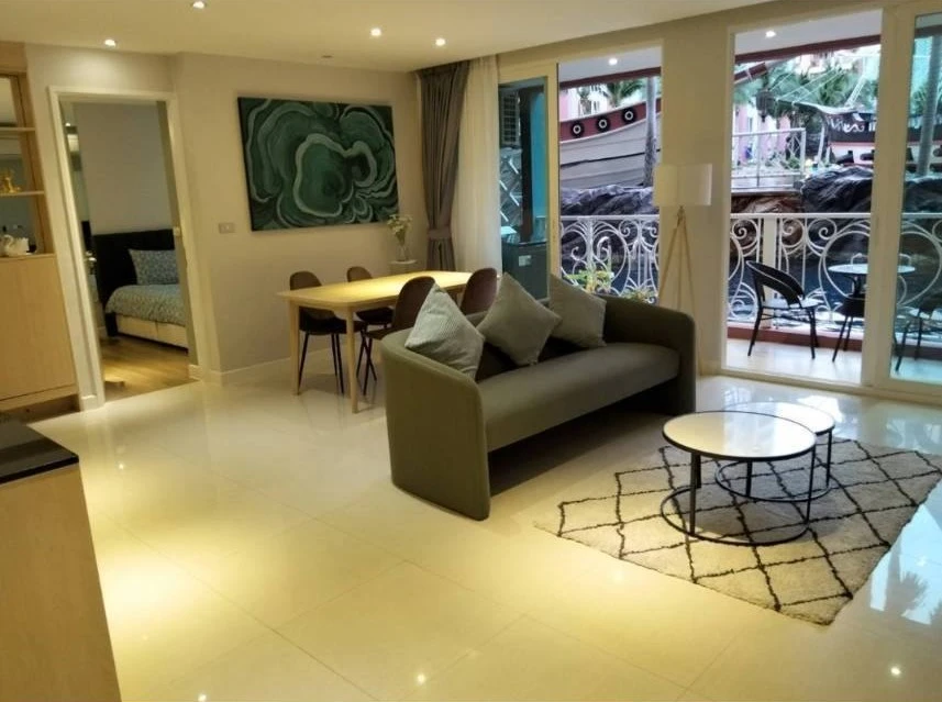 For rent: Grand Caribbean Resort Pattaya, 2 bedrooms, 2 bathrooms, 1st floor, back of the room, open to walk directly into the water park pool. If you