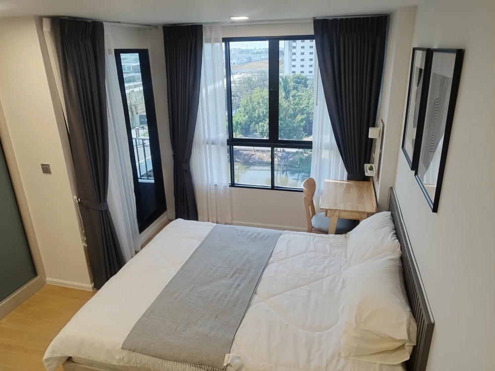 For rent: Atmoz Canal Rangsit, Building D. Unobstructed view, fully furnished, complete appliances. Unit is not next to the elevator or garbage room.