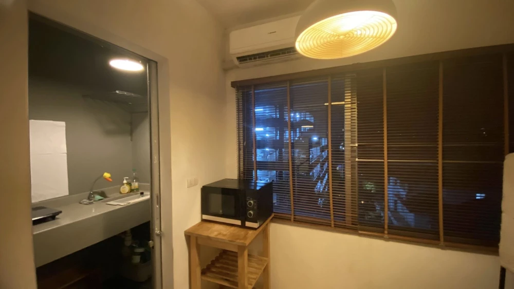Condo for rent at A Space Play Ratchada-Sutthisan. Minimalist design with IKEA-style solid wood furniture and full amenities. Book now!