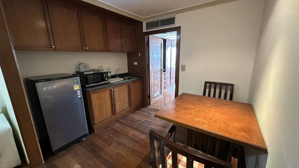 Condo for rent at State Tower Silom. Large and comfortable unit with ample living space on the 42nd floor, offering stunning Chao Phraya River views.