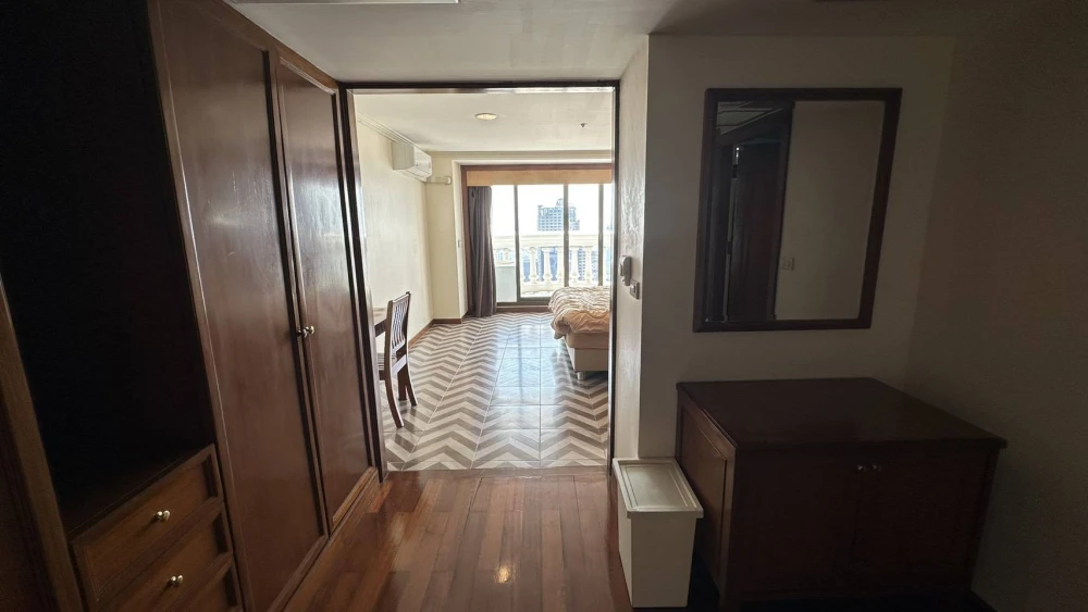 Condo for rent at State Tower Silom. Large and comfortable unit with ample living space on the 42nd floor, offering stunning Chao Phraya River views.