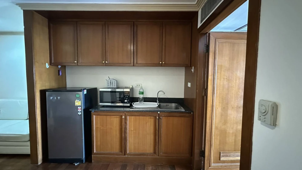 Condo for rent at State Tower Silom. Large and comfortable unit with ample living space on the 42nd floor, offering stunning Chao Phraya River views.