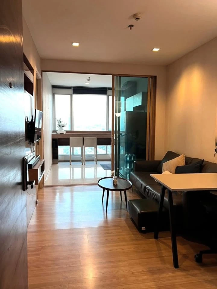 For sale or rent: Rhythm Phahol-Ari Condo, corner unit, quiet and well-ventilated, 23rd floor with high-floor views. Fully furnished. Book now!