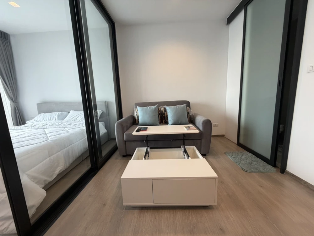 High-Floor Condo for RENT - Cozy 33 sq.m., 28th Floor (Building B), Fully Furnished with Sofa Bed & Dedicated Work Desk, Essential Appliances Included