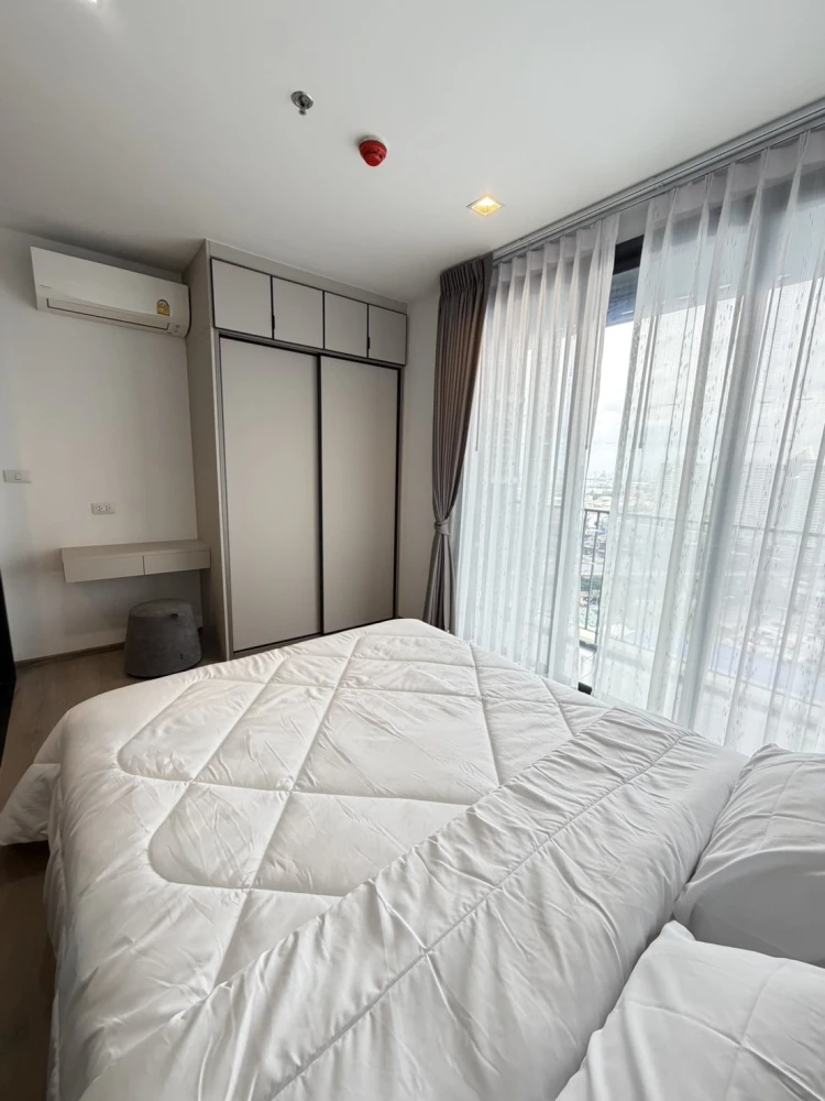 High-Floor Condo for RENT - Cozy 33 sq.m., 28th Floor (Building B), Fully Furnished with Sofa Bed & Dedicated Work Desk, Essential Appliances Included