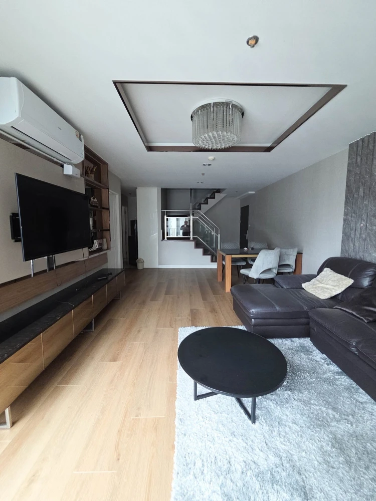 For rent immediately! Belle Grand Rama9 Duplex unit with spacious living area and complete amenities. Book now!
