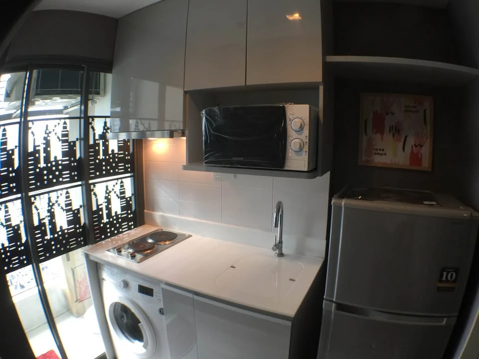 Studio apartment for rent at Ideo Mobi Rama9, fully furnished, 26th floor. Features a high-quality built-in kitchen. Convenient and complete amenities
